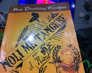 Boy Buys Copy of Dr Jose Rizal’s Book